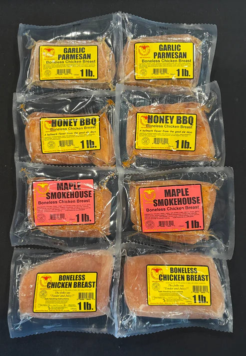 Classic Chicken Breast Bundle with 8 marinated, flavor-infused chicken breasts in Garlic Parmesan, Honey BBQ, Maple Smokehouse, and house marinade, arranged on a tray ready to cook or grill.