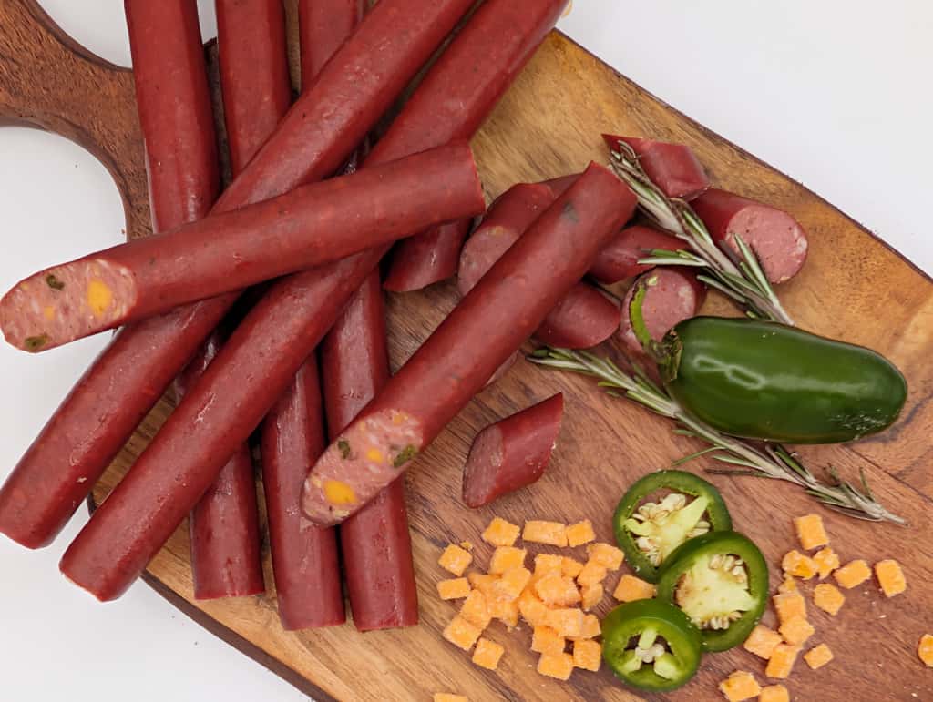 Jalapeño cheddar beef sticks retail display from Wisconsin River Meats, smoked beef snack sticks with cheese