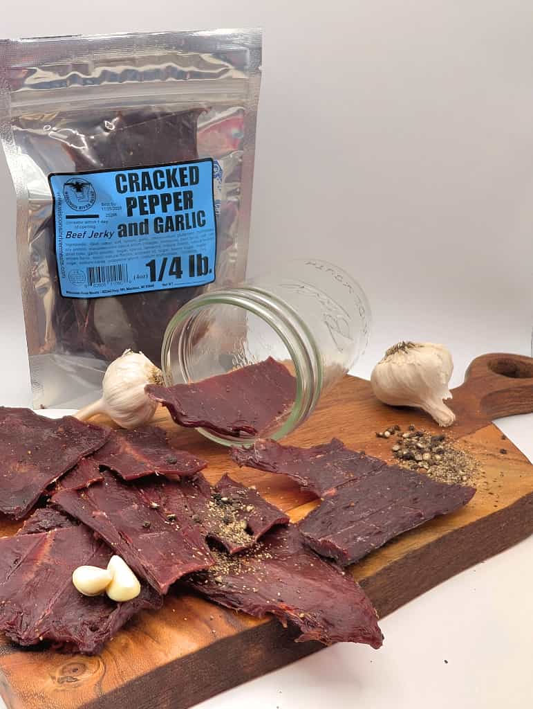 Cracked pepper and garlic beef jerky retail display from Wisconsin River Meats, bold savory beef jerky