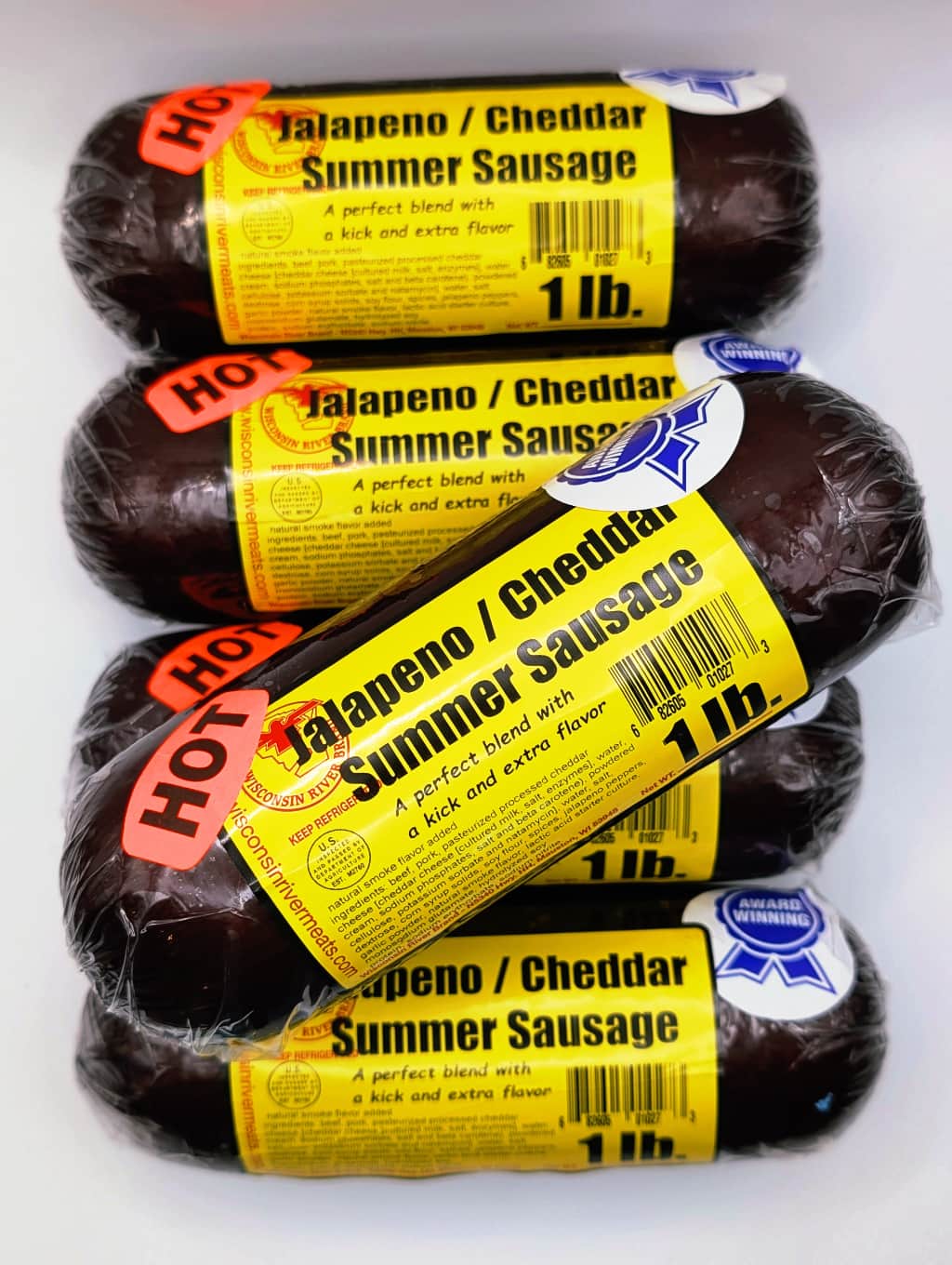 5 lb jalapeño cheddar summer sausage made with premium beef, spicy jalapeños, and real cheddar cheese
