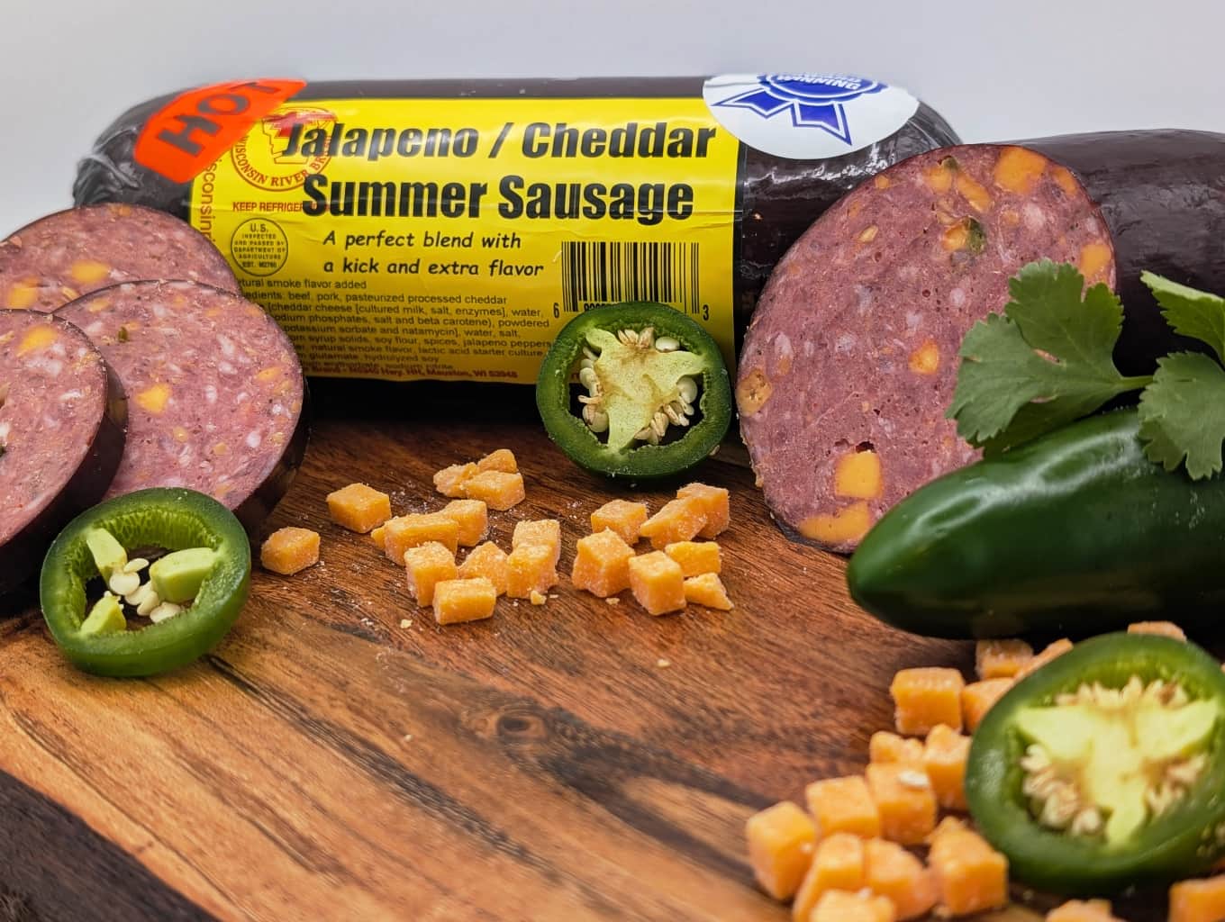 1 pound jalapeño cheddar summer sausage with beef, smoked flavor, and real cheddar cheese