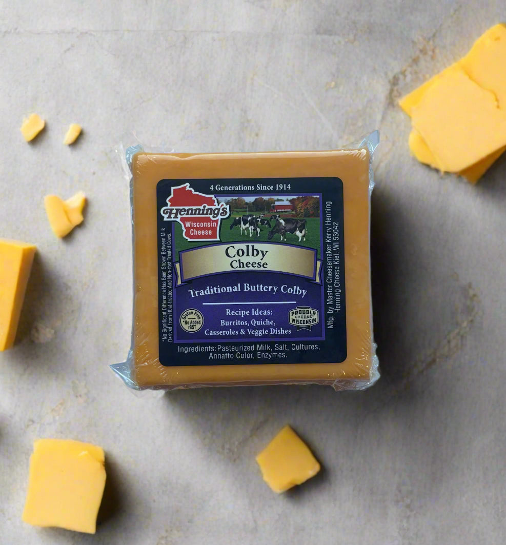 Creamy Colby cheese block – mild American cheese perfect for melting, slicing, or snacking