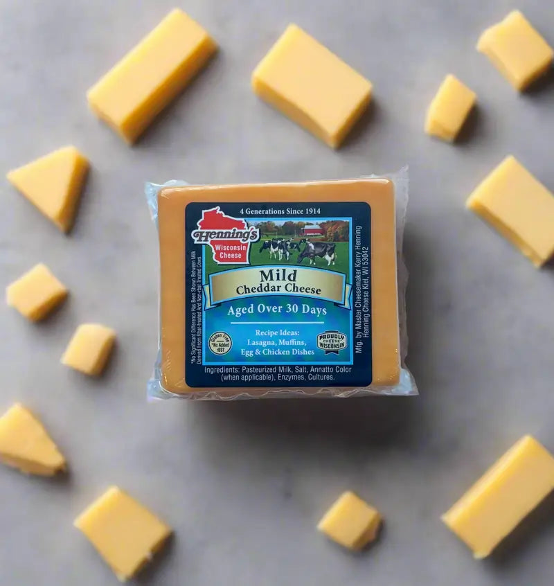 2 lb vacuum‑sealed block of Wisconsin cheddar cheese – sharp, creamy cow’s milk cheese perfect for slicing, shredding, melting